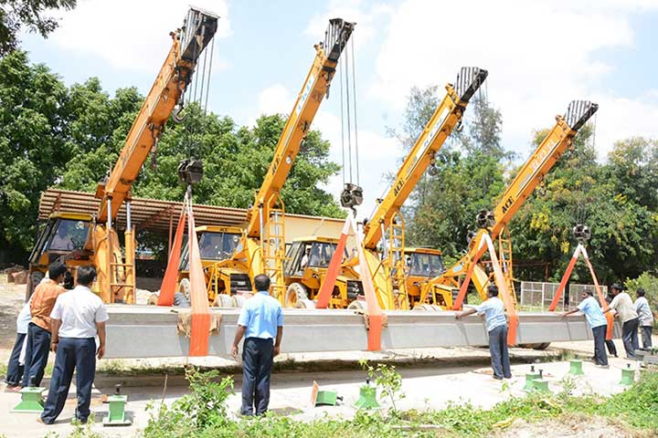 4 Cranes working in tandem to load the plate on to the truck